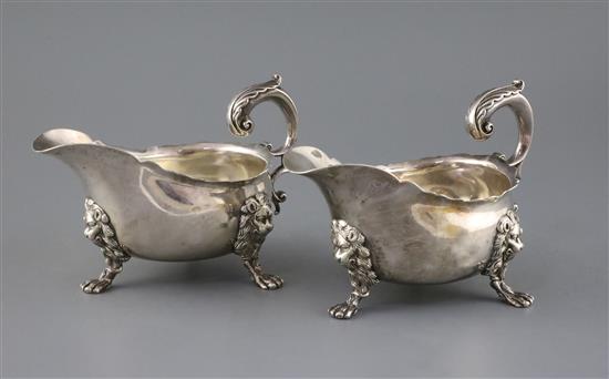 A pair of George V 18th century style silver sauceboats by Thomas of New Bond Street, 28 oz.